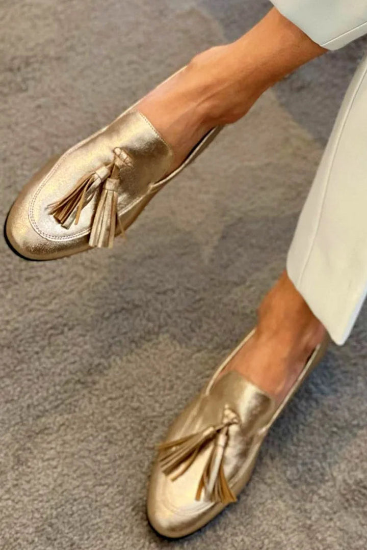 GOLDEN MOCCASINS WITH TASSELS
