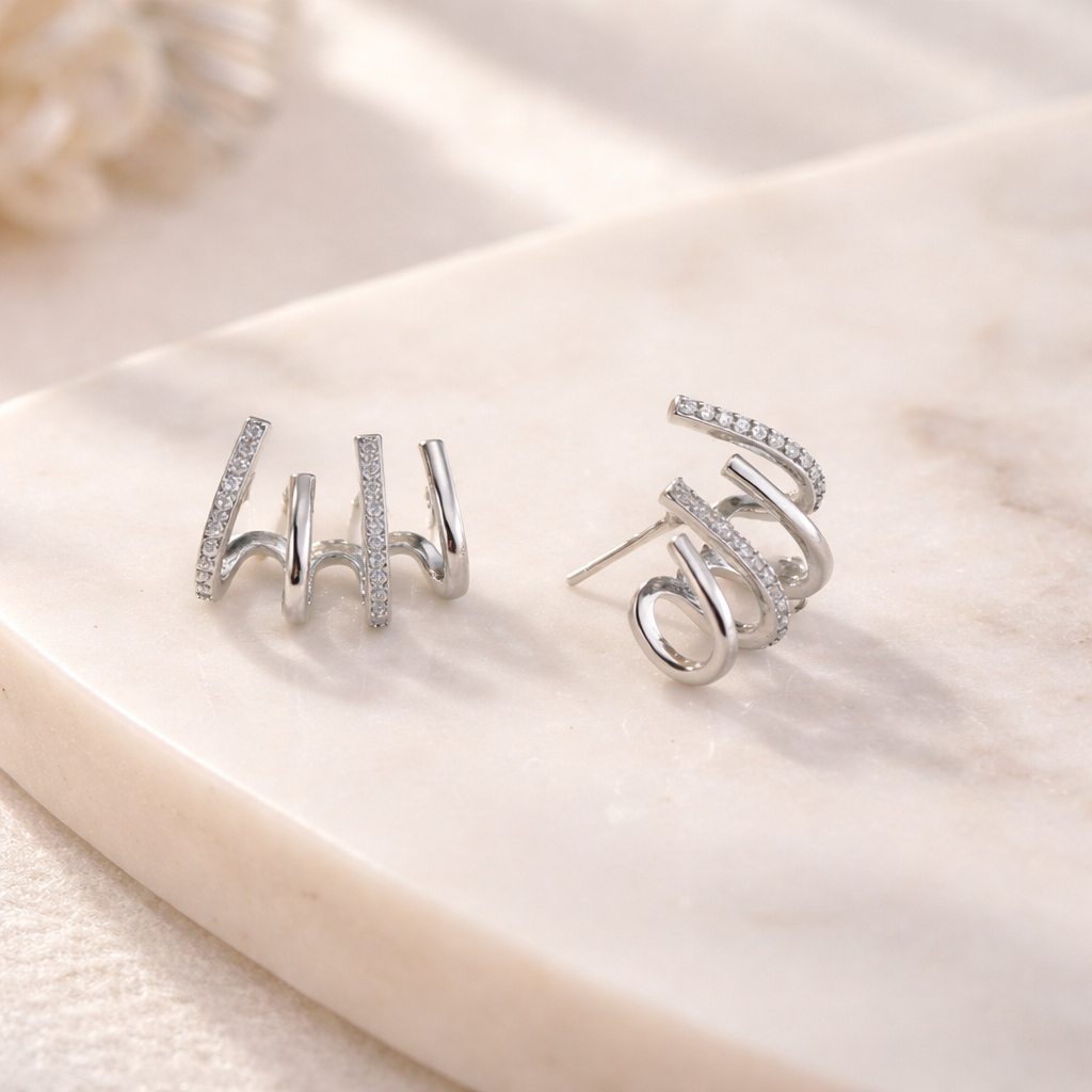 Zirconia-Studded Claw Earrings